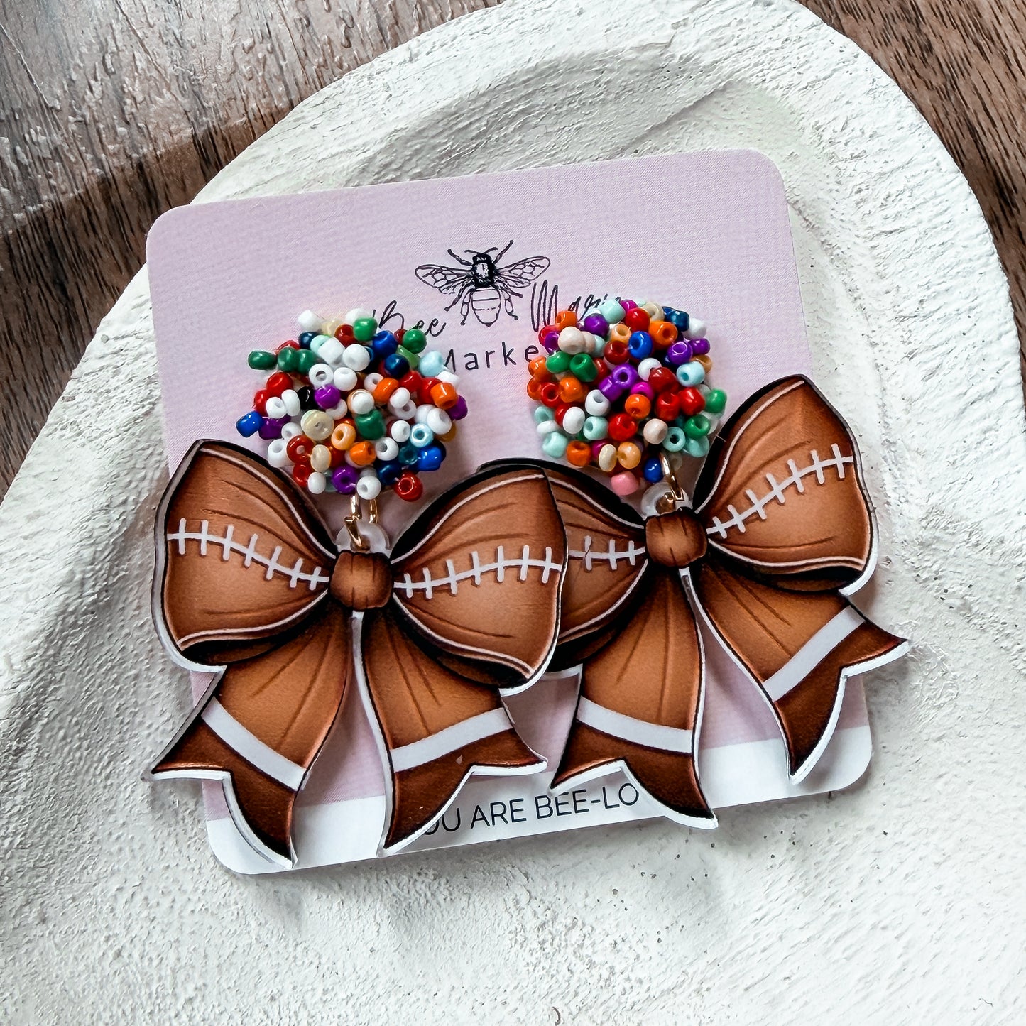 Beaded Football Bow Statement Earrings