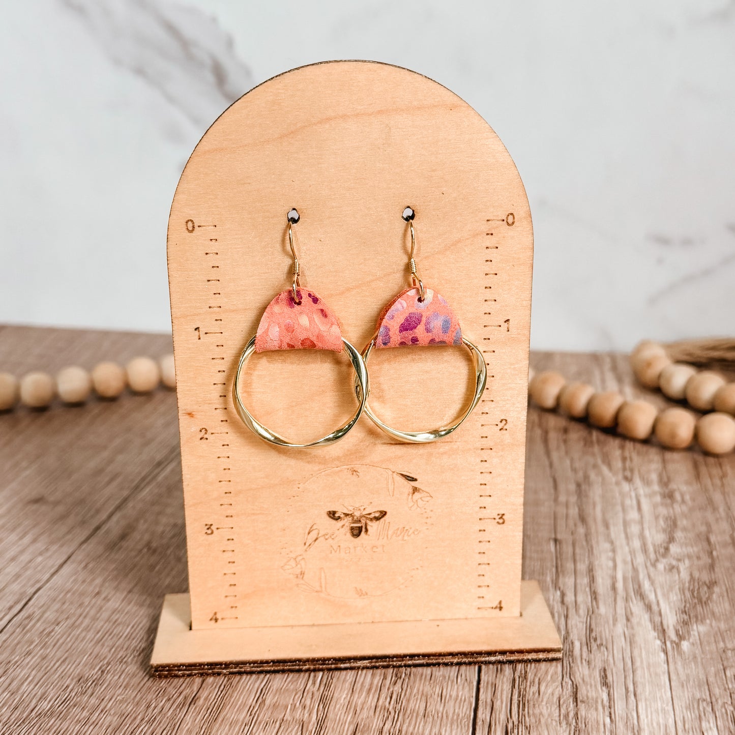 Peach Animal Print Twisted Gold Hoops