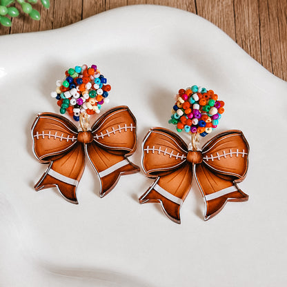 Beaded Football Bow Statement Earrings