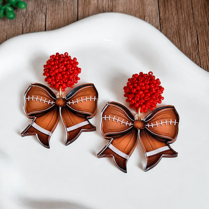 Beaded Football Bow Statement Earrings