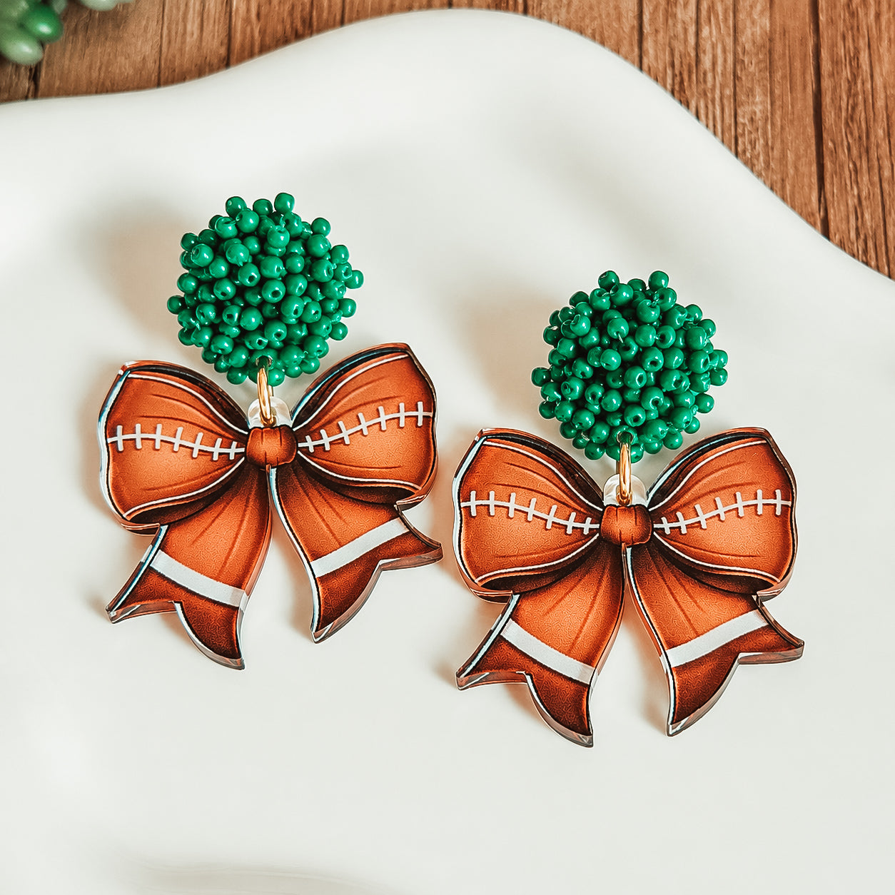 Beaded Football Bow Statement Earrings