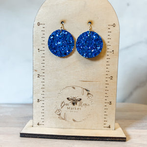 Rebel Round Blue Glitter Earrings