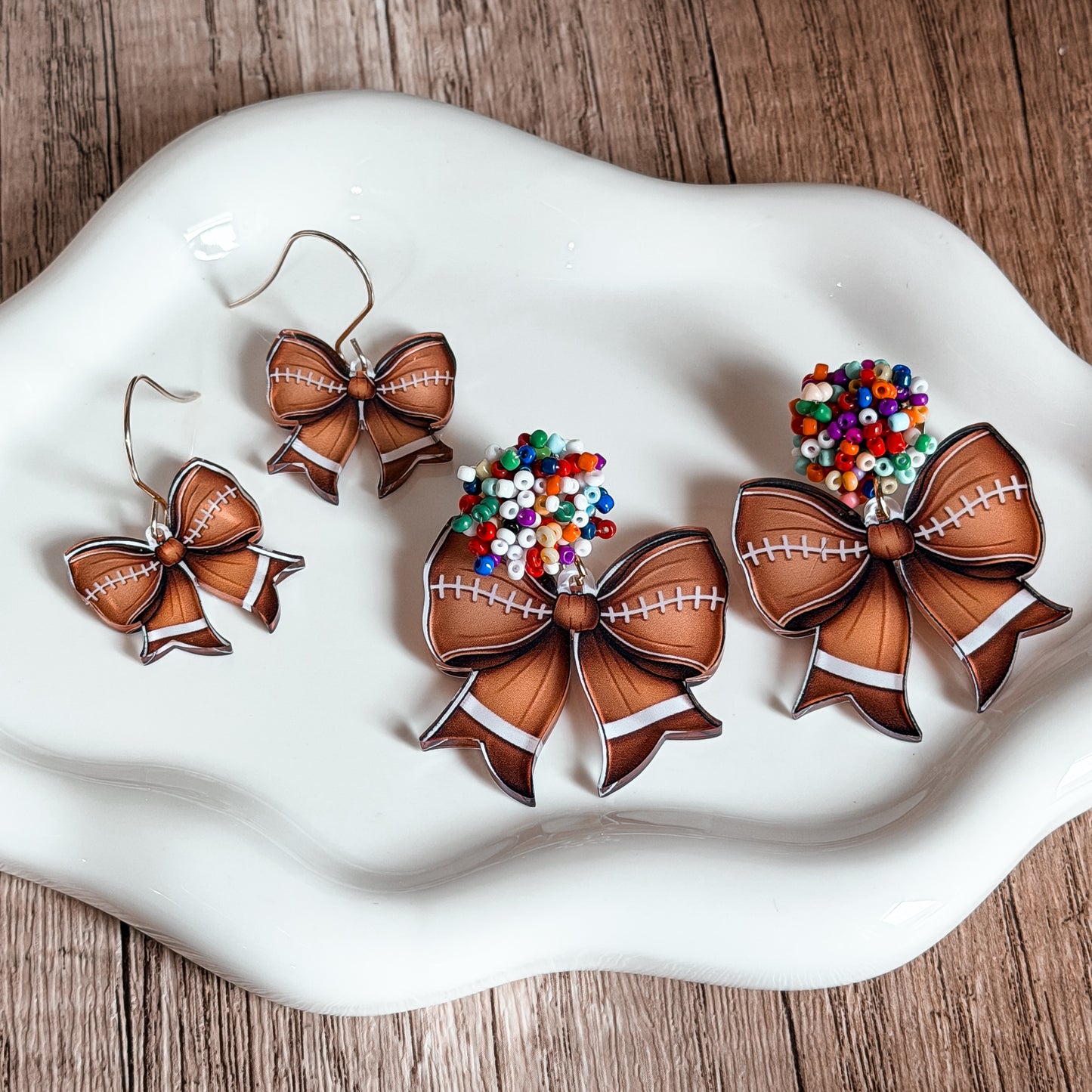 Beaded Football Bow Statement Earrings