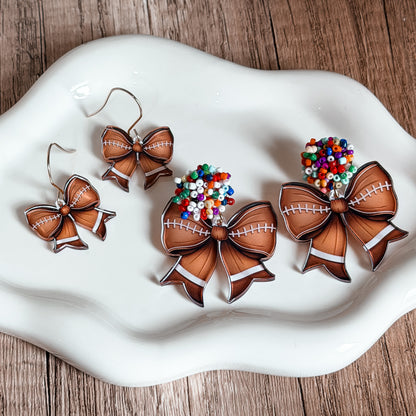 Beaded Football Bow Statement Earrings