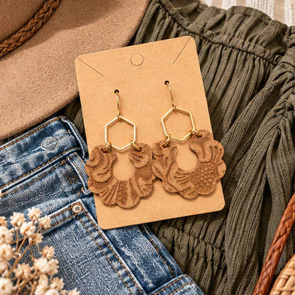 Brown leather and lace scallop earrings with boutique outfit flat lay